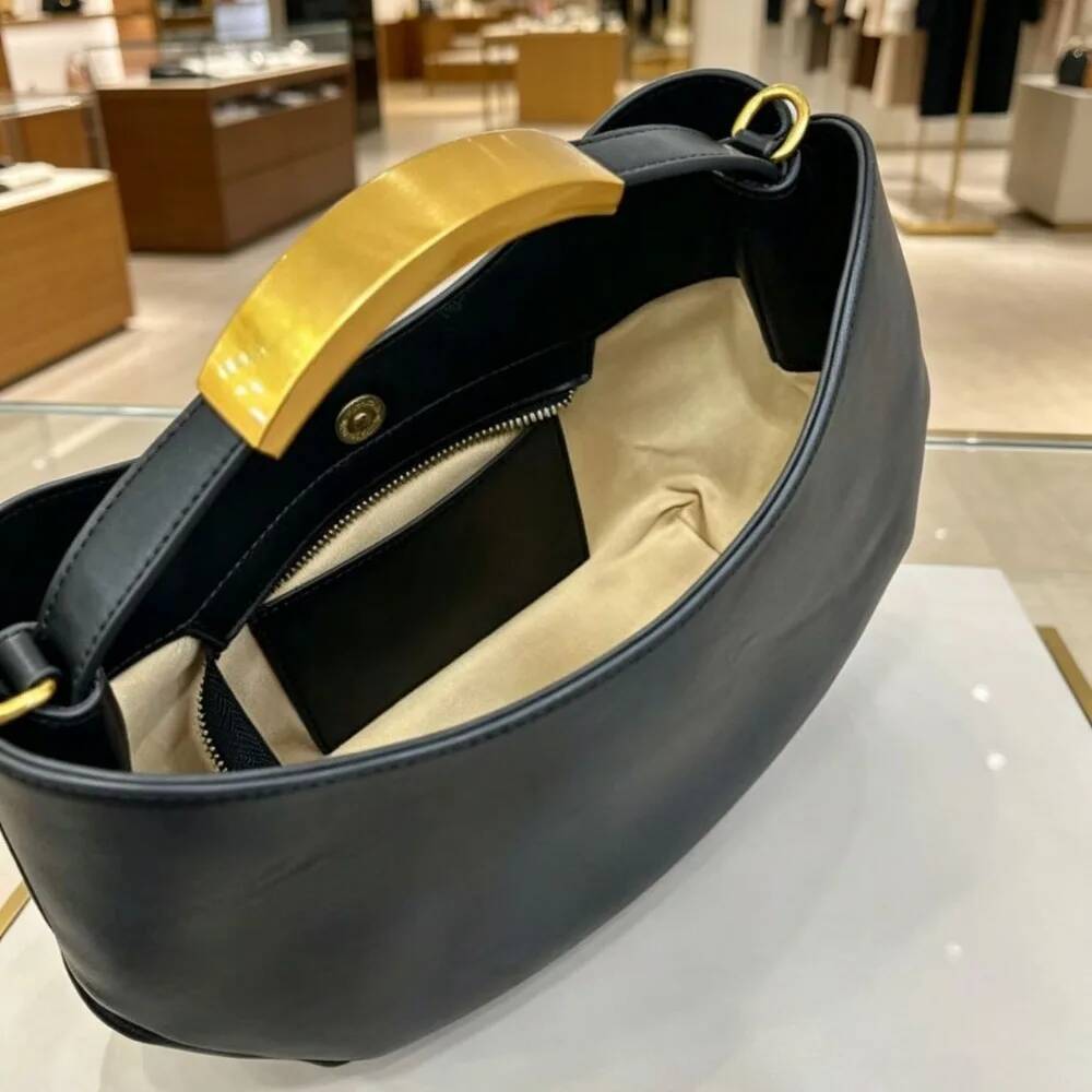 Borsa a secchiello da donna a  - Luxury Bags Gold recensione e prezzo